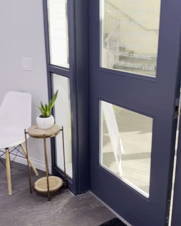 Inside Back in Health: the entrance, bright treatment rooms and hands-on massage